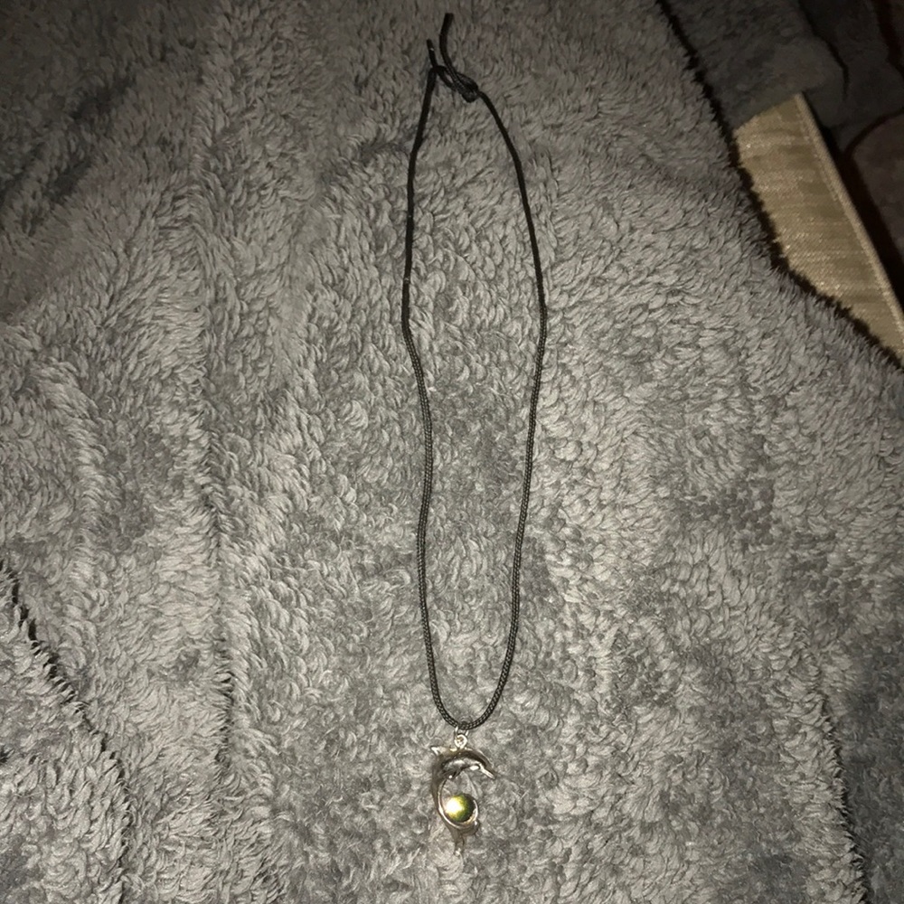 Mood stone necklace set on dolphin tail